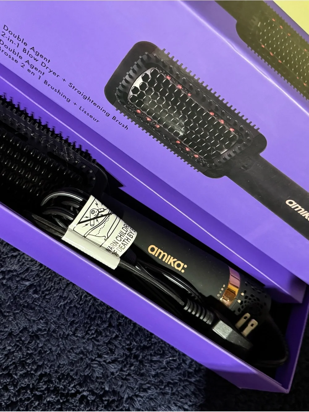 amika Black Paddle Straightening Brush with Pink Logo